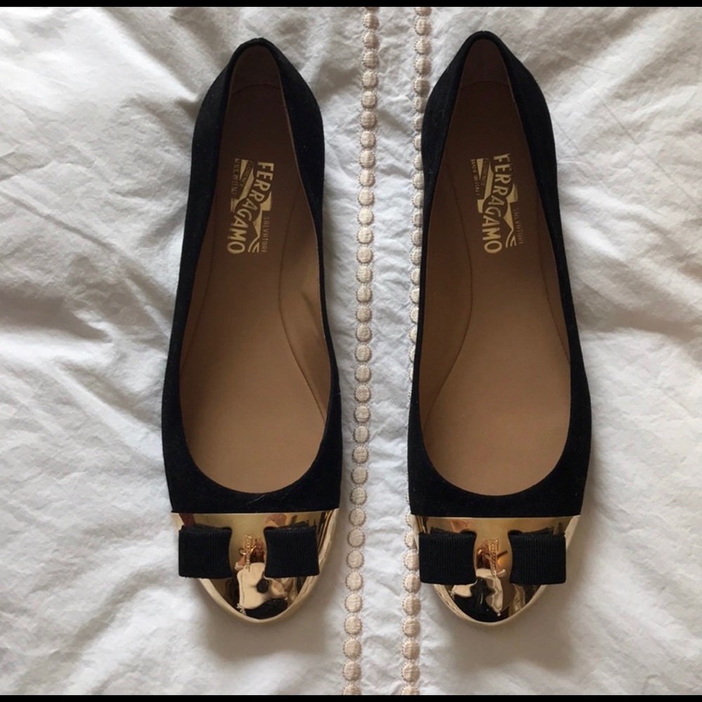 Ferragamo flats with gold cap toe